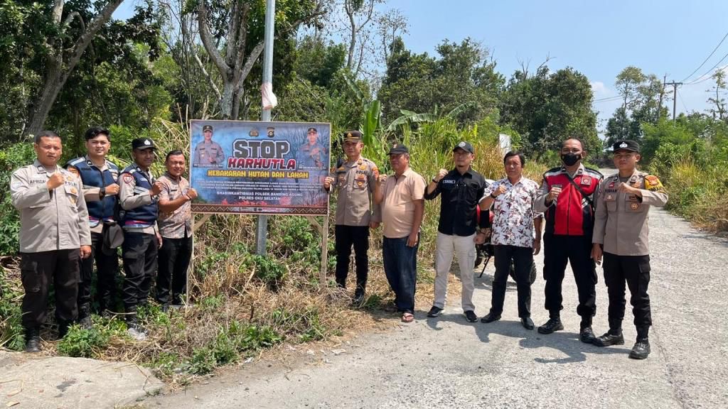 Polsek Banding Agung Gelar Patroli Gabungan dan Pasang Spanduk Imbauan Karhutla di Desa Kota Batu