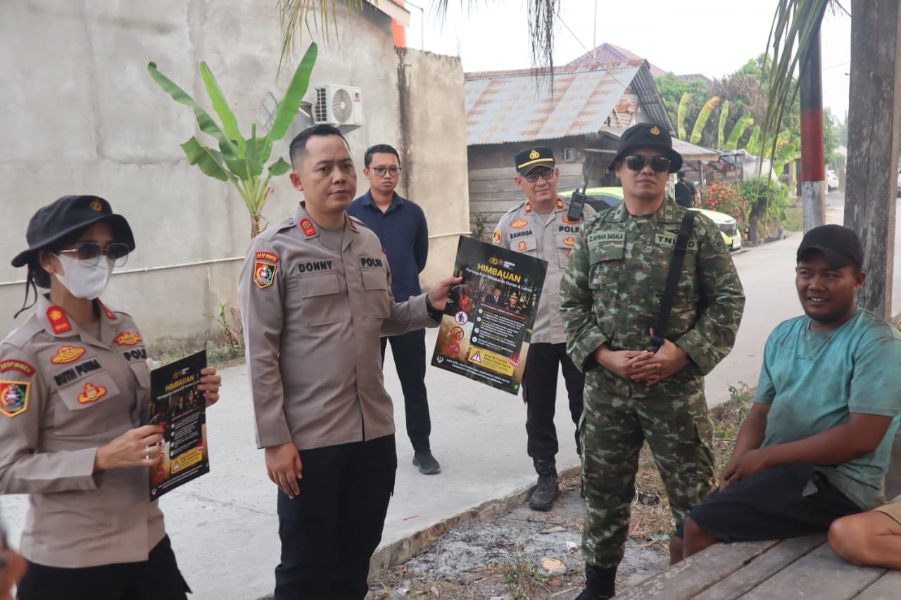 *Serdik Sespimmen Polri Dikreg Ke-67 Sosialisasikan Pencegahan Karhutla dan Bagikan Masker kepada Warga*