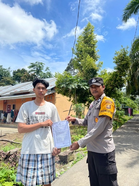 Bhabinkamtibmas Polsek Tebing Tinggi Sambangi Desa Kota Gading, Sosialisasikan Larangan Membakar Hutan dan Lahan
