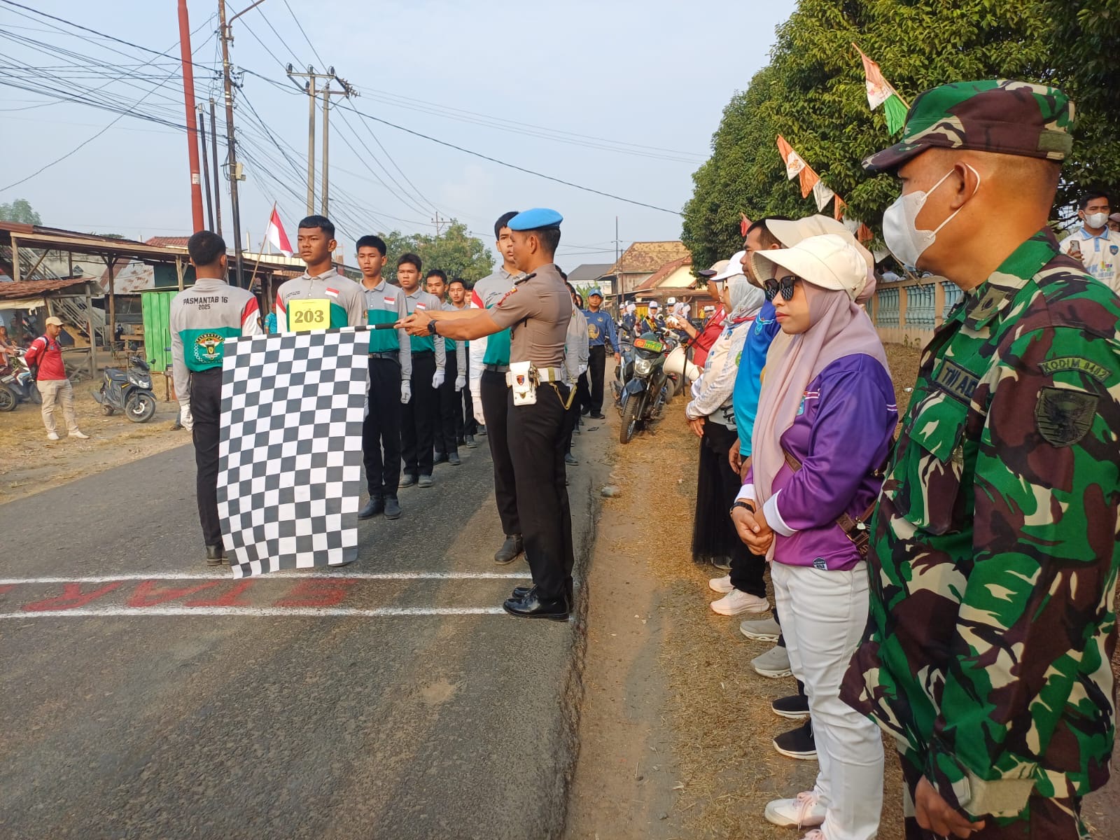 Semarak HUT Kemerdekaan RI ke-81, Polsek Tanjung Batu Amankan Kegiatan Gerak Jalan