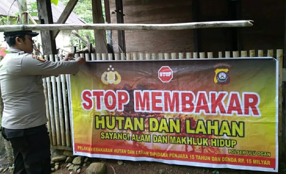 Cegah Karhutla, Bhabinkamtibmas Polsek Ulu Ogan Sosialisasi Stop Membakar Hutan Dan Lahan